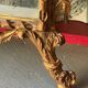 Antique mirror above a chest of drawers or between two windows, carved wood, 18th century