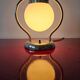 Art Deco table lamp with a spherical opaline glass shade and chrome base from the 1930s.