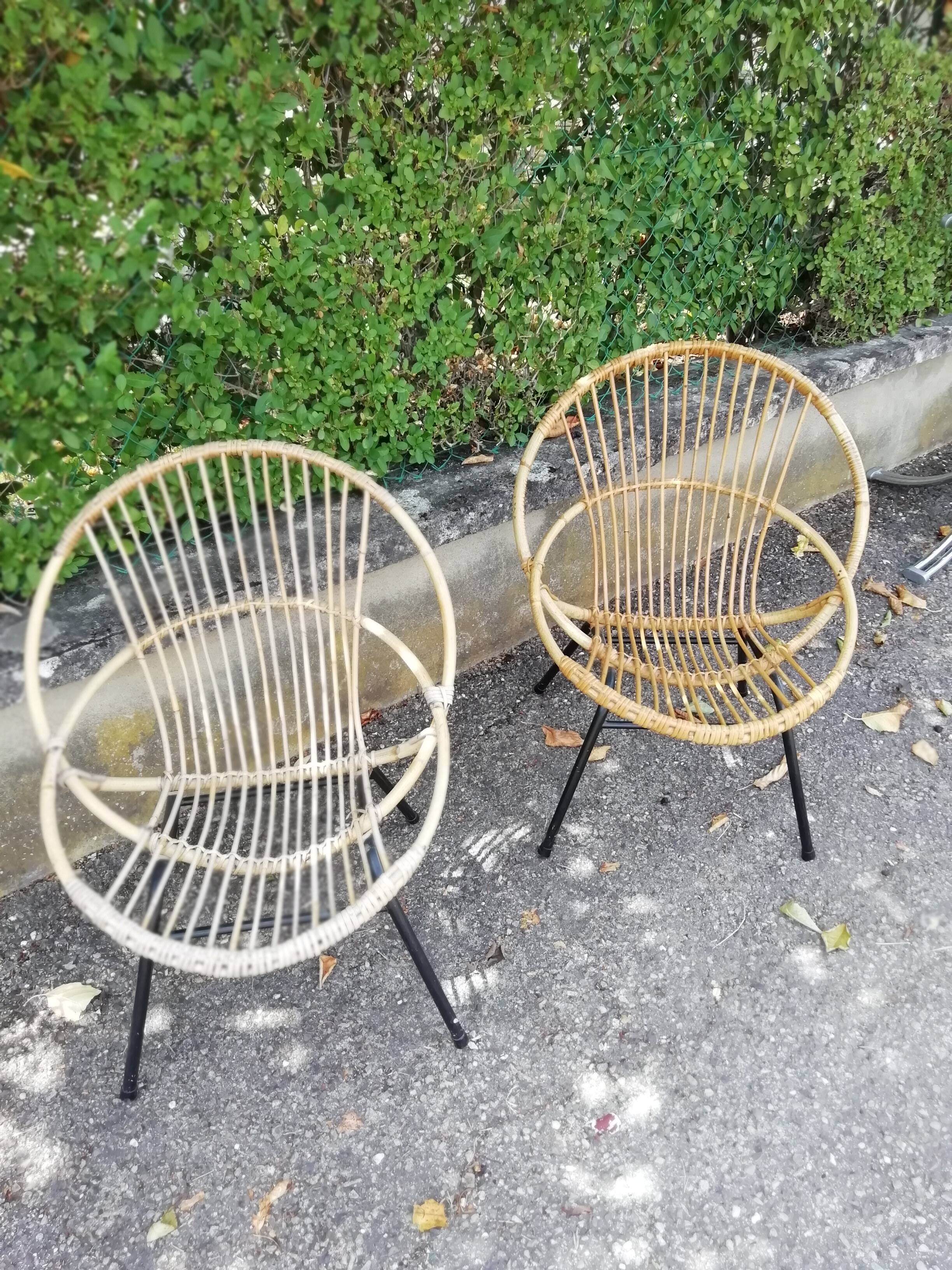2 Rattan shell armchairs and metal legs