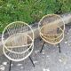 2 Rattan shell armchairs and metal legs