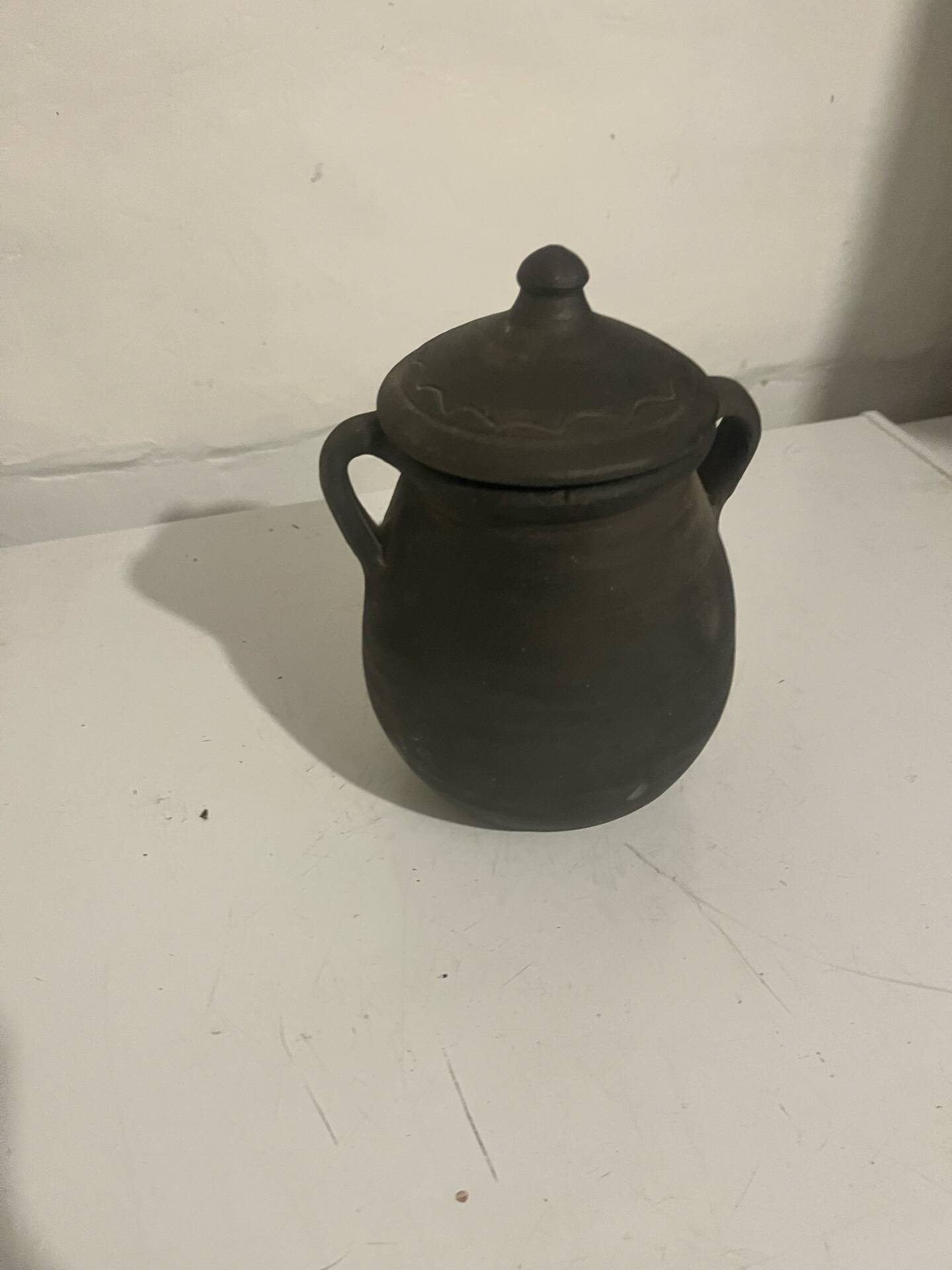 Vintage black ceramic covered pot signed Gómez Miranda — Pottery a