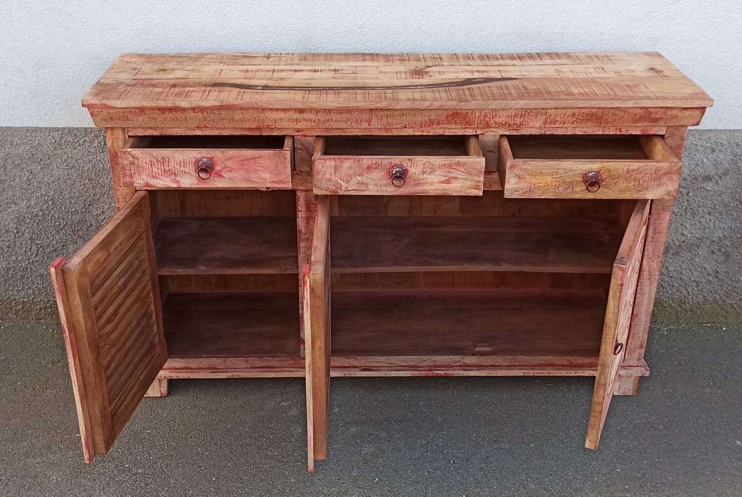 Wooden sideboard with red highlights