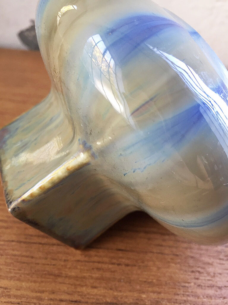 Small blue ceramic vase