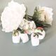 Lot de 4 ronds de serviette en barbotine.