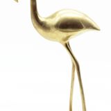 Brass heron statue
