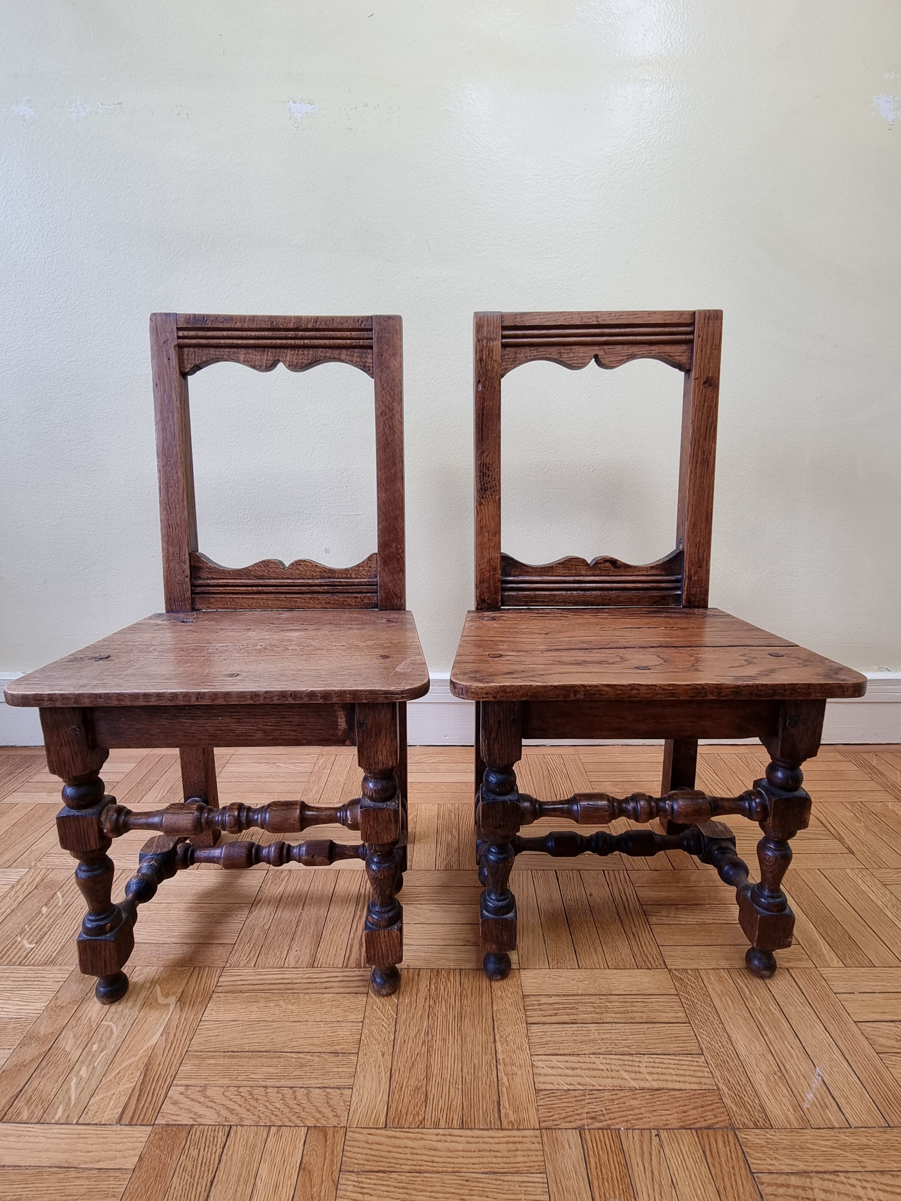 Pair of old children's chairs made of solid wood