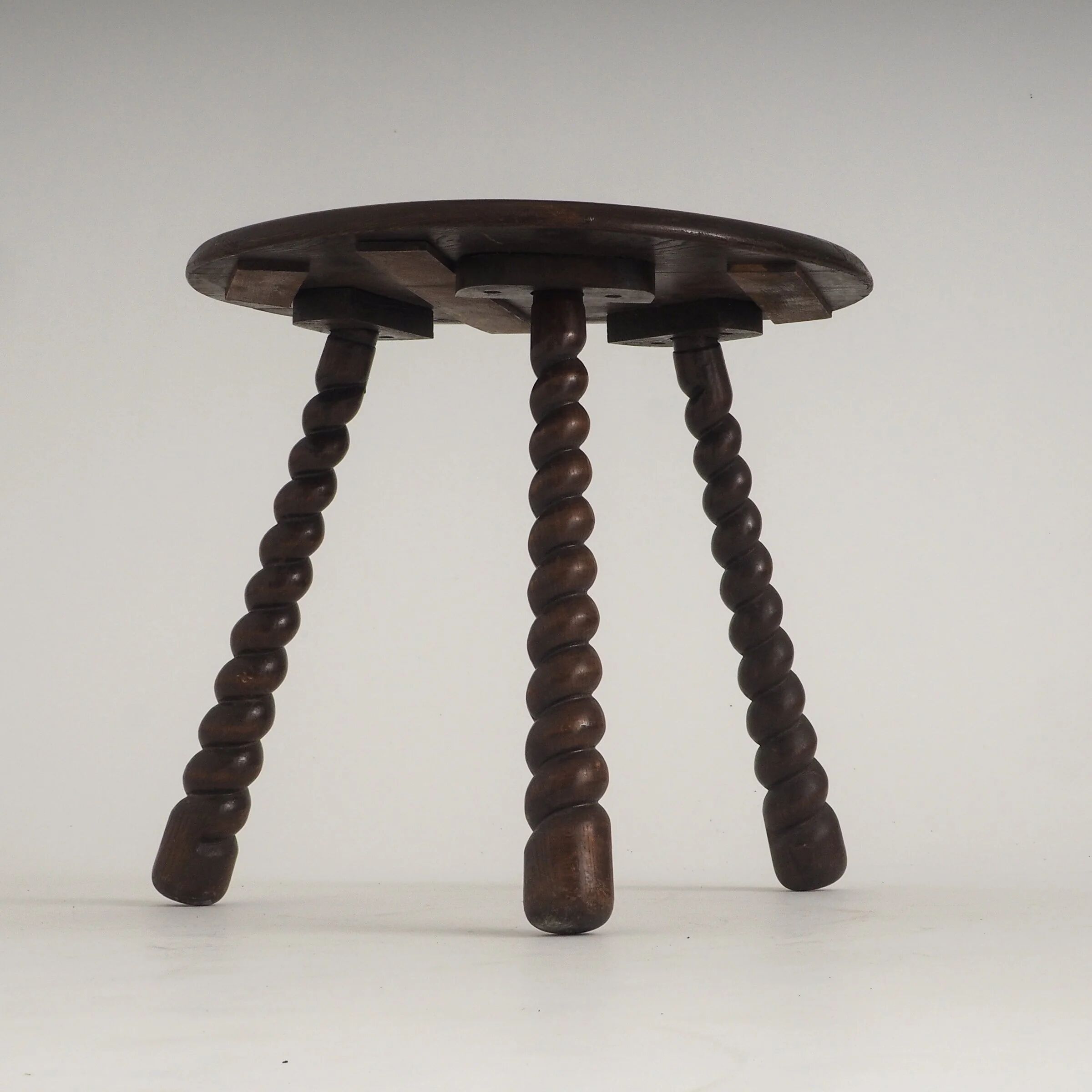 French oak tripod side table attributed to Charles Dudouyt