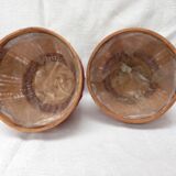 Duo of vintage braided wicker pot cover