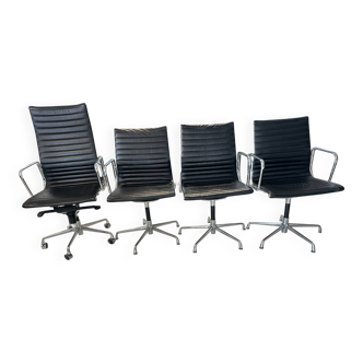 Set of 4 Charles & Ray Eames leather armchairs, 1980