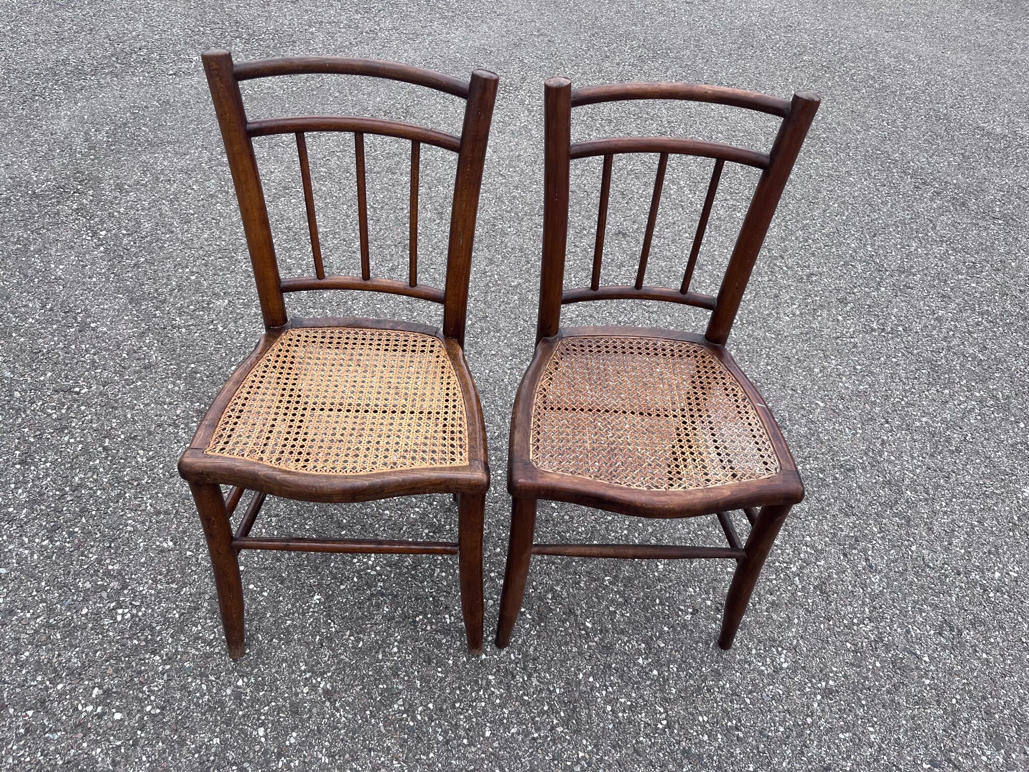 Pair of canned bistro chairs