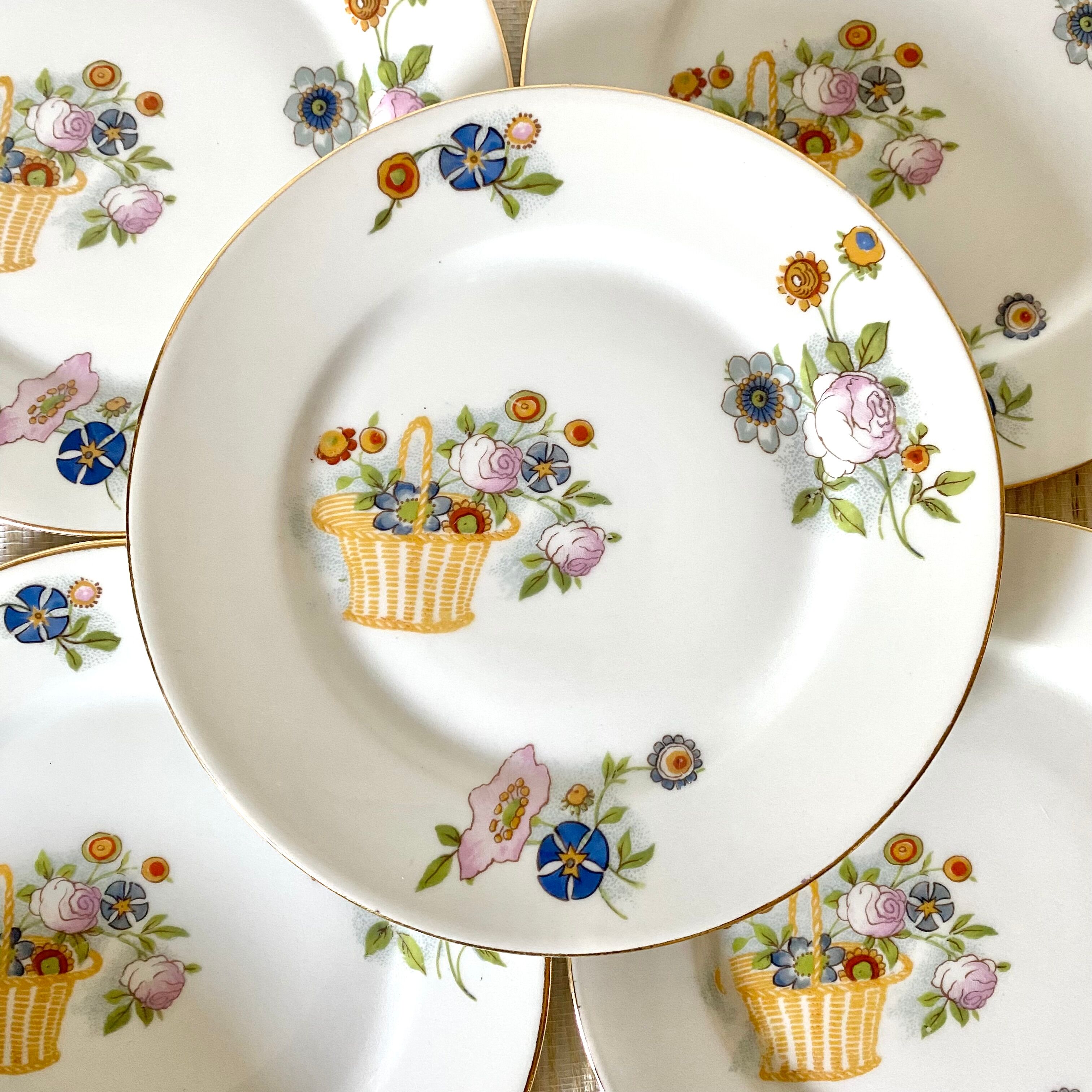 12 Assiettes à dessert en porcelaine de Limoges