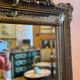 Bevelled mirror with gilded stucco parclose, from the Napoleon III period