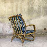 Vintage armchair in rattan and floral fabric