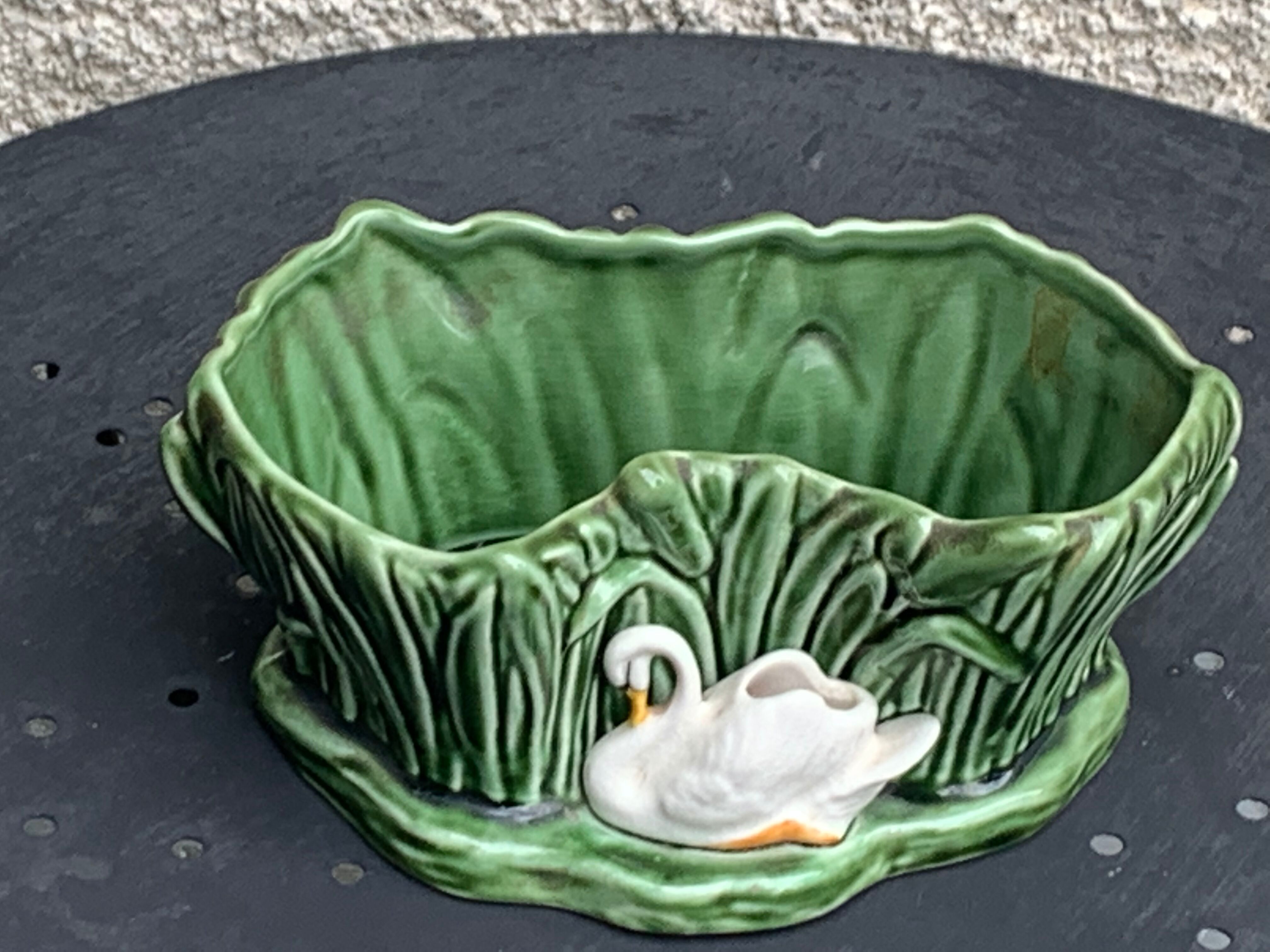 Pot cover in ceramic slurry glazed green pattern foliage and swan made in england numbered