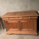 Honey-colored wood sideboard
