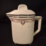 Old covered jug, vintage, geometric frieze with flowers and black trim.