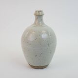 Stoneware bottle with abstract plant motif signed Herbes Folles