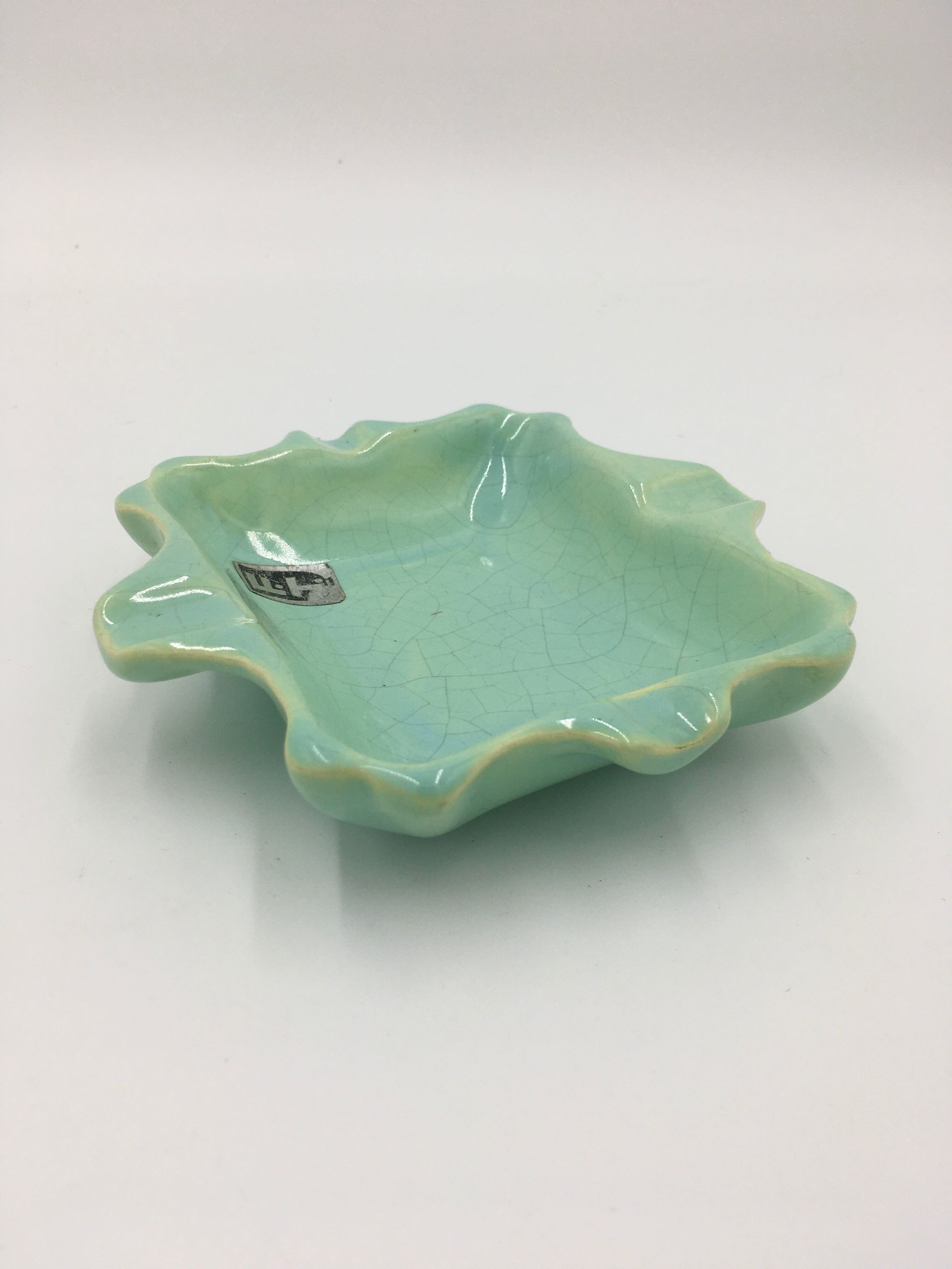 F.T. ceramic ashtray