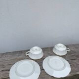 Pair of Limoges porcelain cups with gold trim