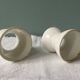 Set of 4 white porcelain diabolo shells