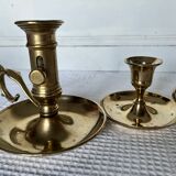 Duo of brass hand candle holders