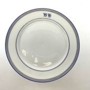 Compotier or flat cut with monogrammed white biscuit cake