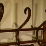 Curved beech wall coat rack published by Thonet, 1930s.