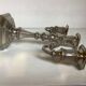 Large silver-plated metal three-light candlestick
