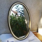 Ancien miroir ovale guilloché doré et peint