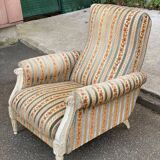 2 Louis XVI bergère armchairs in solid wood with beige and blue embroidered fabric.