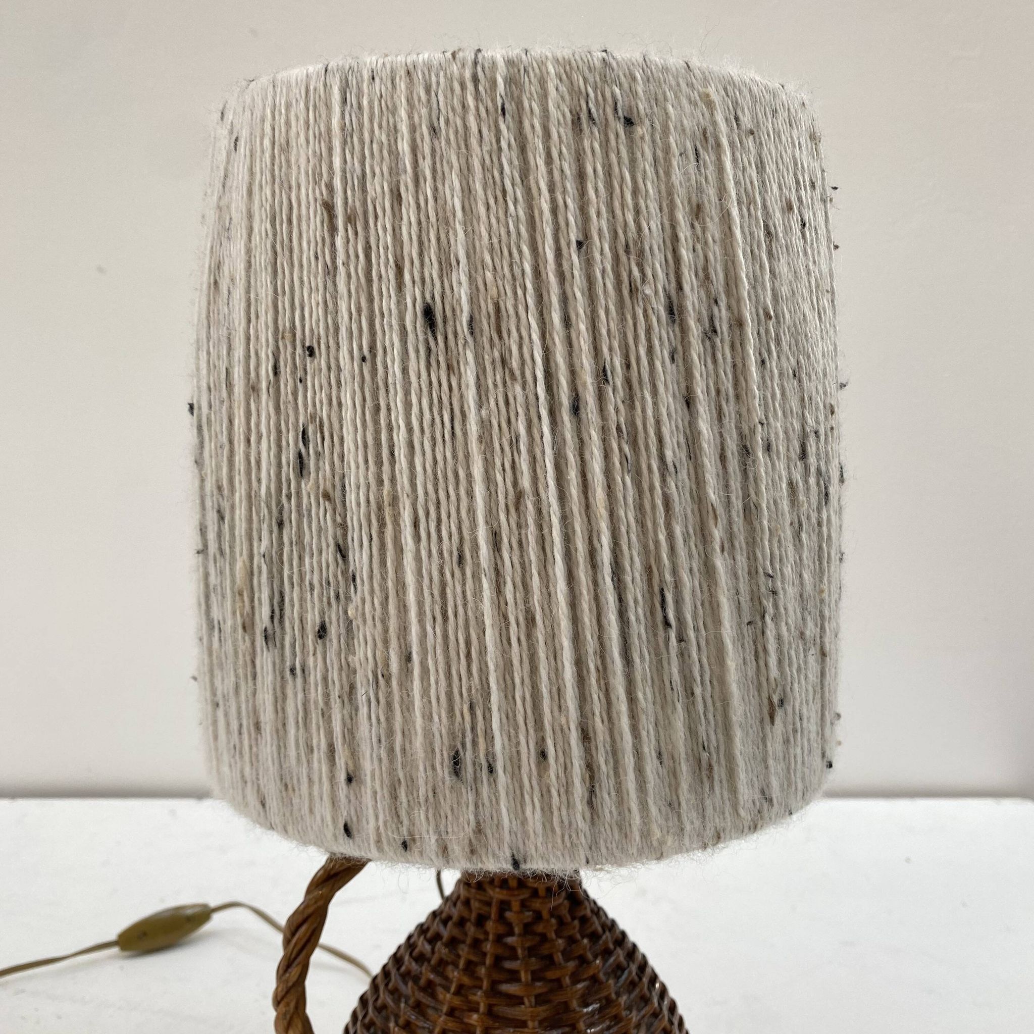 Rattan lamp and its mottled white wool lampshade