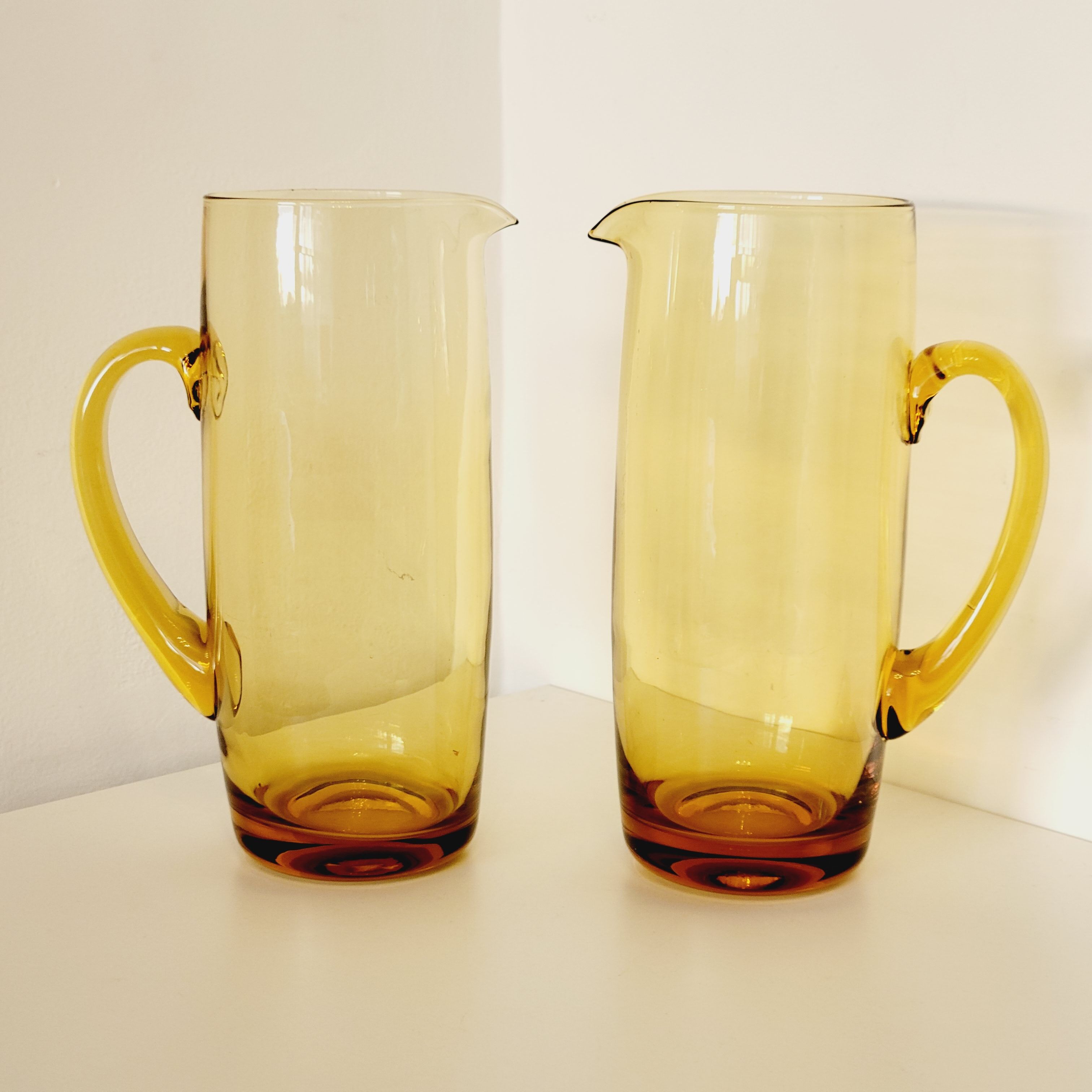 2 carafes in vintage amber yellow blown glass