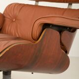 Fauteuil lounge avec repose-pieds en cuir aniline, conçu par Charles et Ray Eames