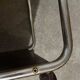 1970s/80s coffee table on casters with metal tubing, light-colored door