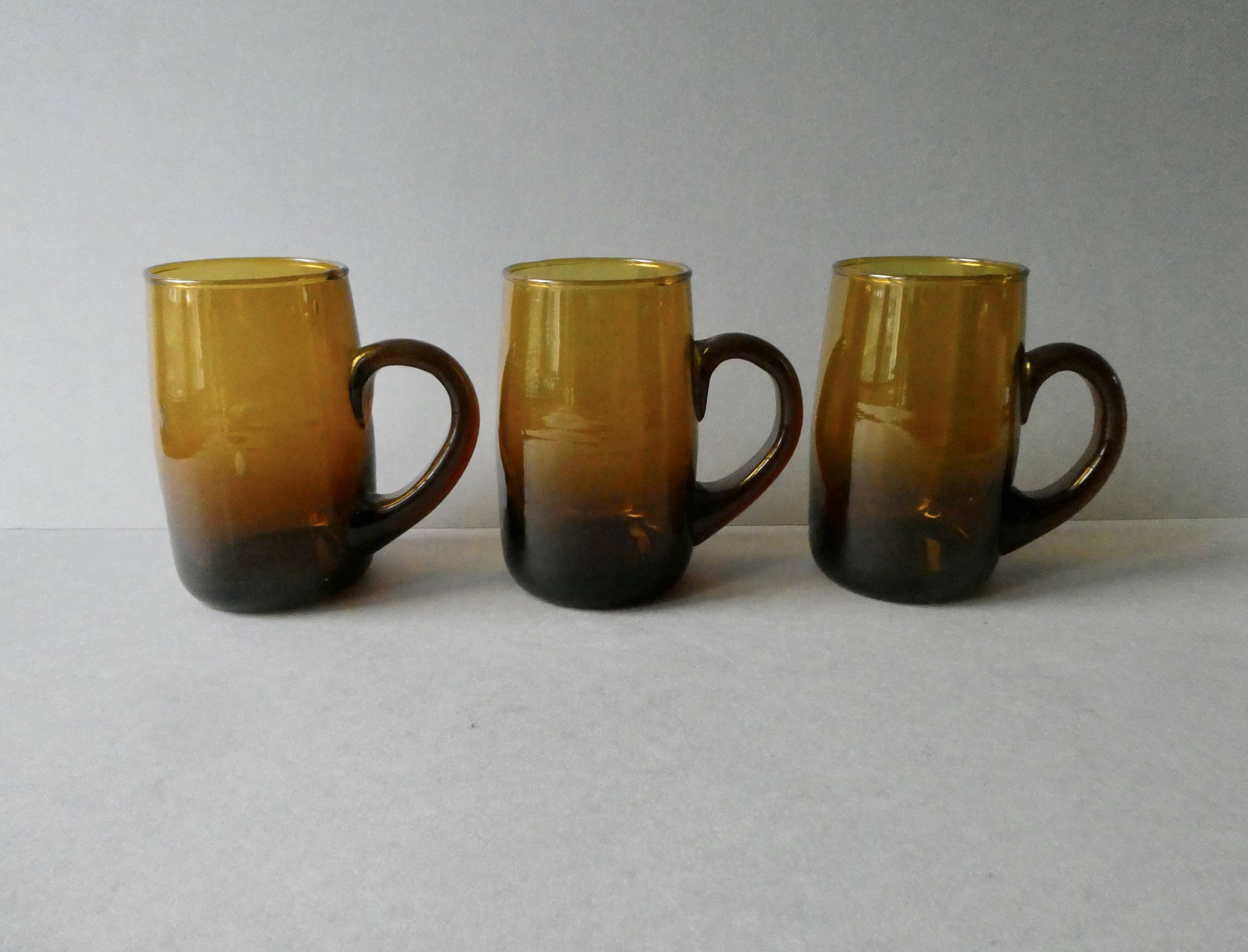 1 blown glass pitcher and its cups, 60s-70s