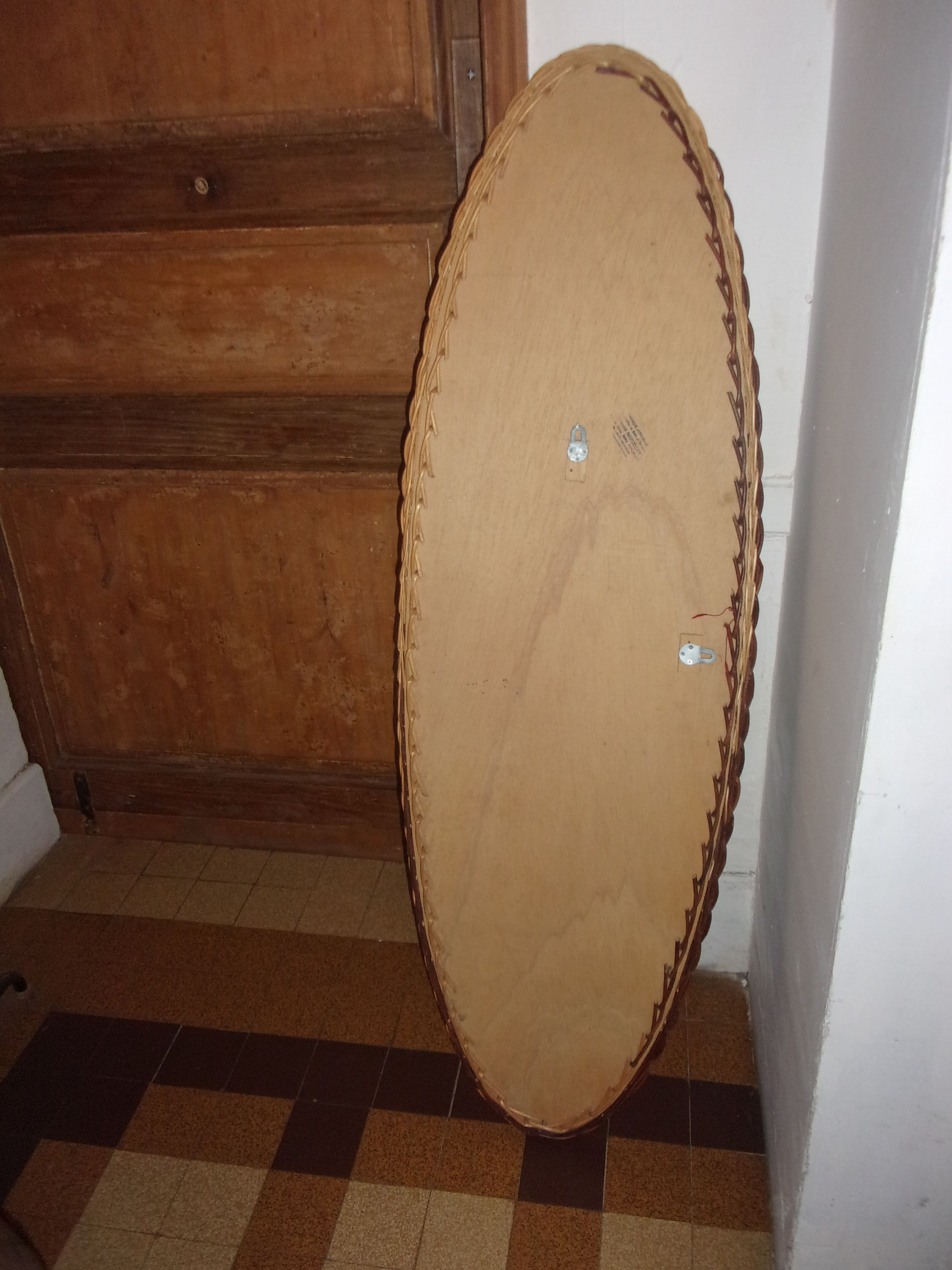 Oval-style rattan mirror