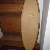 Oval-style rattan mirror