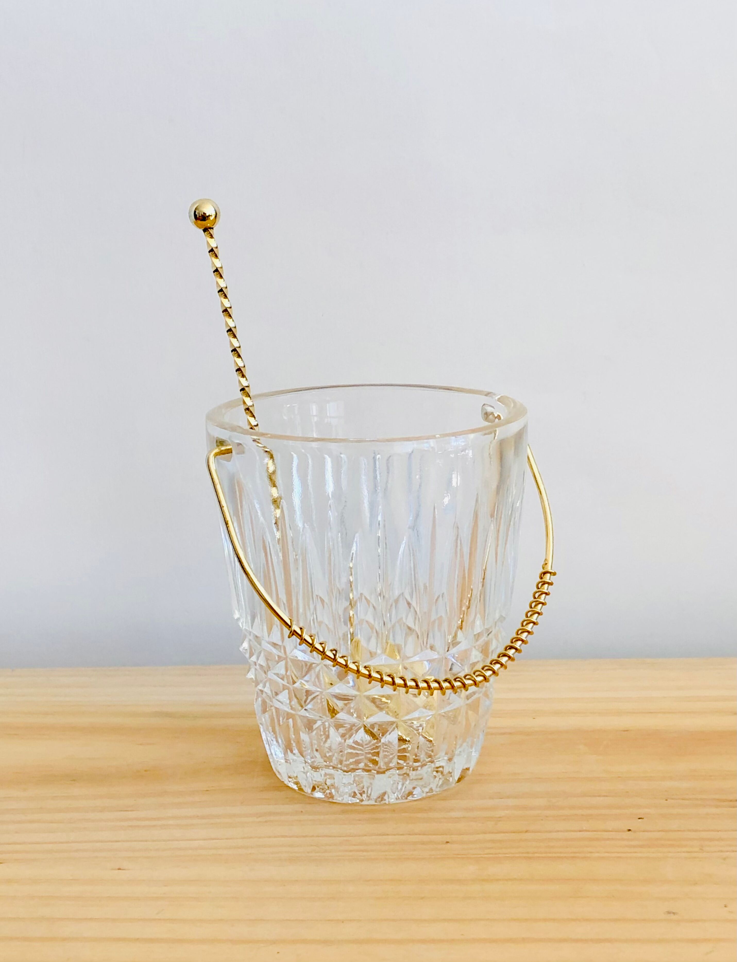 Crystal ice bucket and spoon thereof