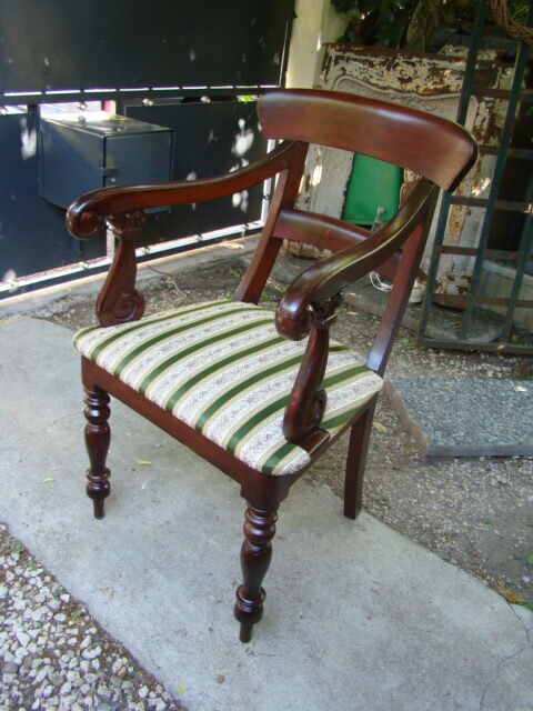 Ancient English mahogany armchair
