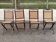 4 chaises pliables en bois massif cannées à réparer