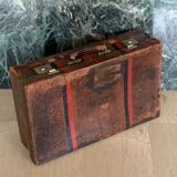 Rare old English suitcase stamped with the royal crown