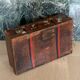 Rare old English suitcase stamped with the royal crown