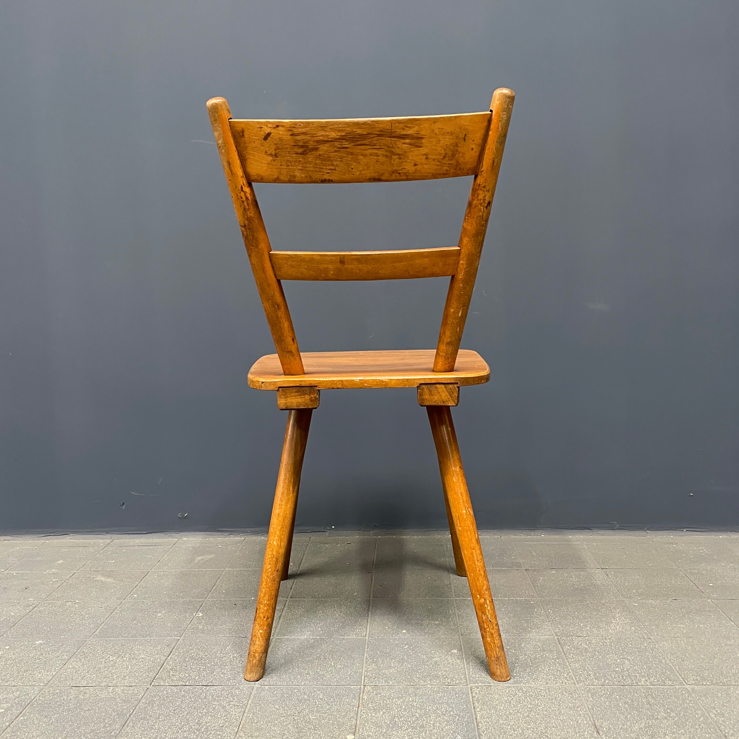 Set of eight german stick chairs from the 1950