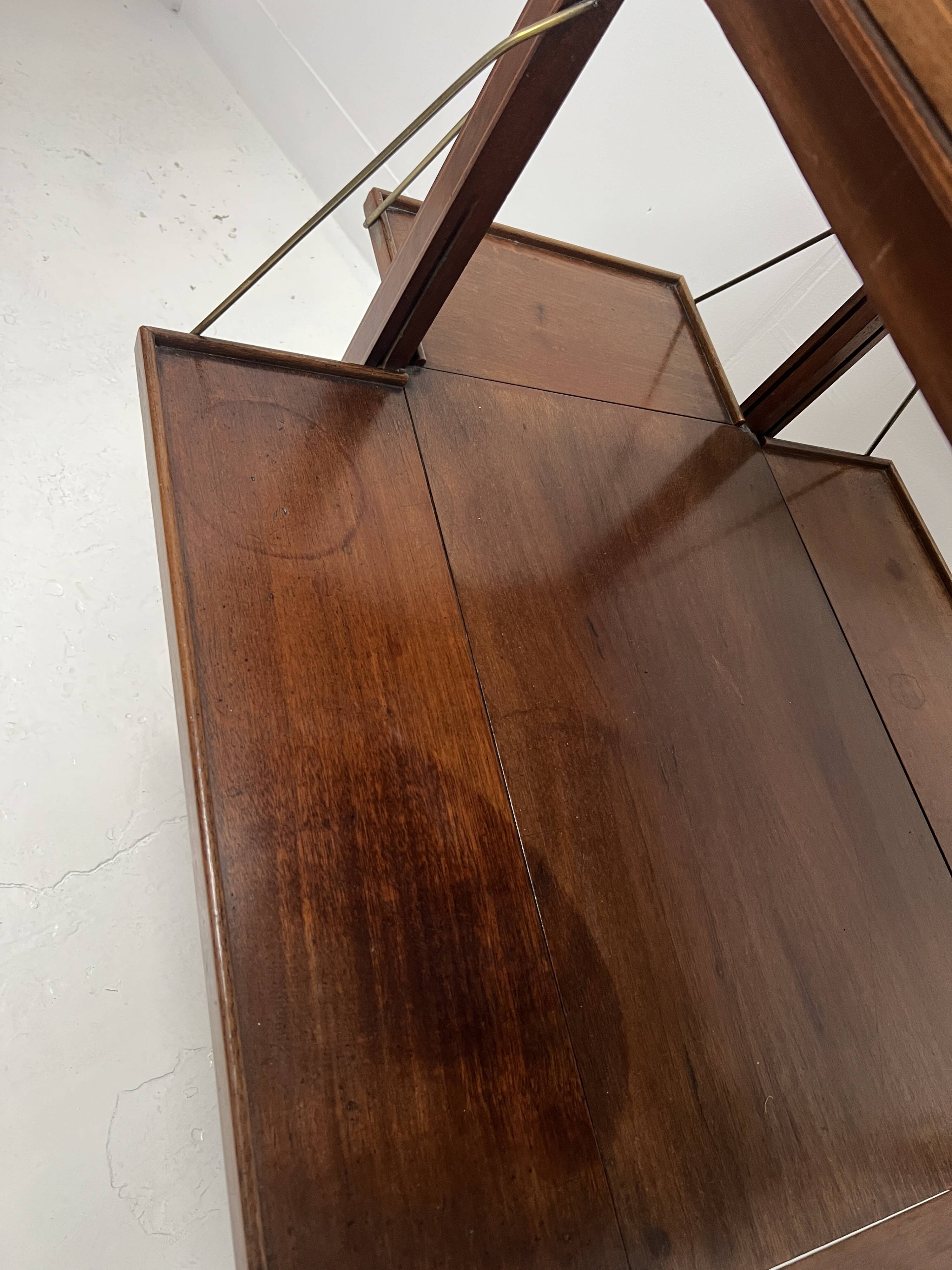 Mahogany serving table with marquetry inlay decoration, 20th century.