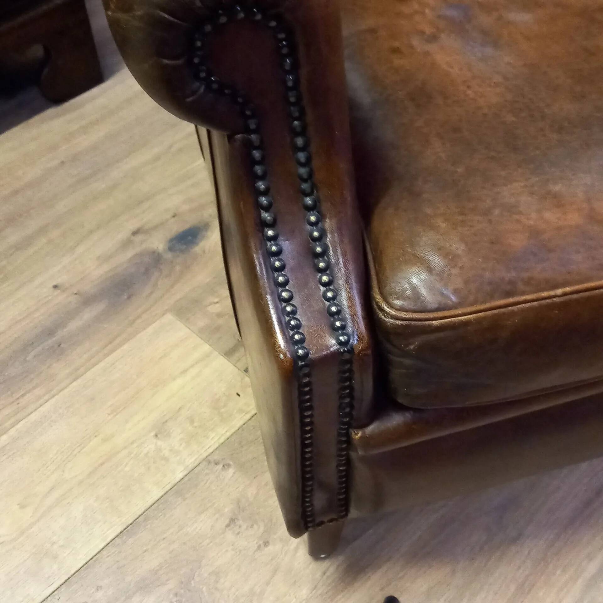 Club armchair in sheepskin in Art Deco style
