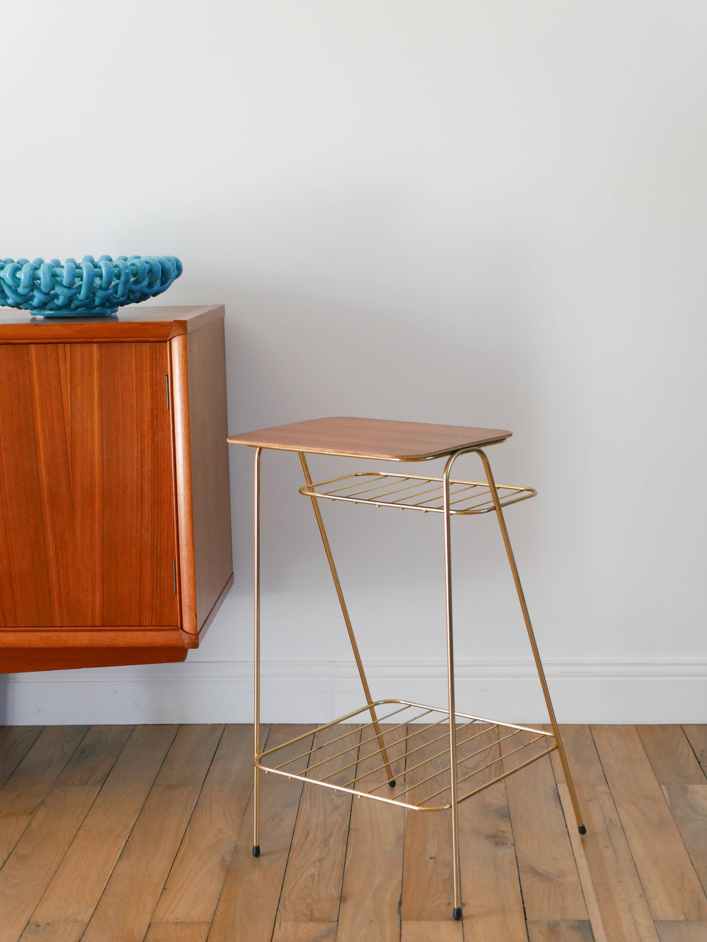 Small brass side table with a teak top, 1960.
