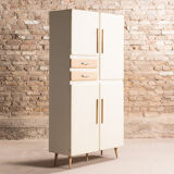 Cupboard equipped with plenty of storage, circa 1950