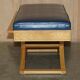 David Linley Hall bench in ostrich leather and satinwood with storage.