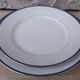 2 round dishes Limoges porcelain blue and gold border