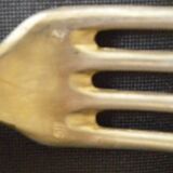 23 seats: 12 forks, 11 spoons, silver metal, 2 punches